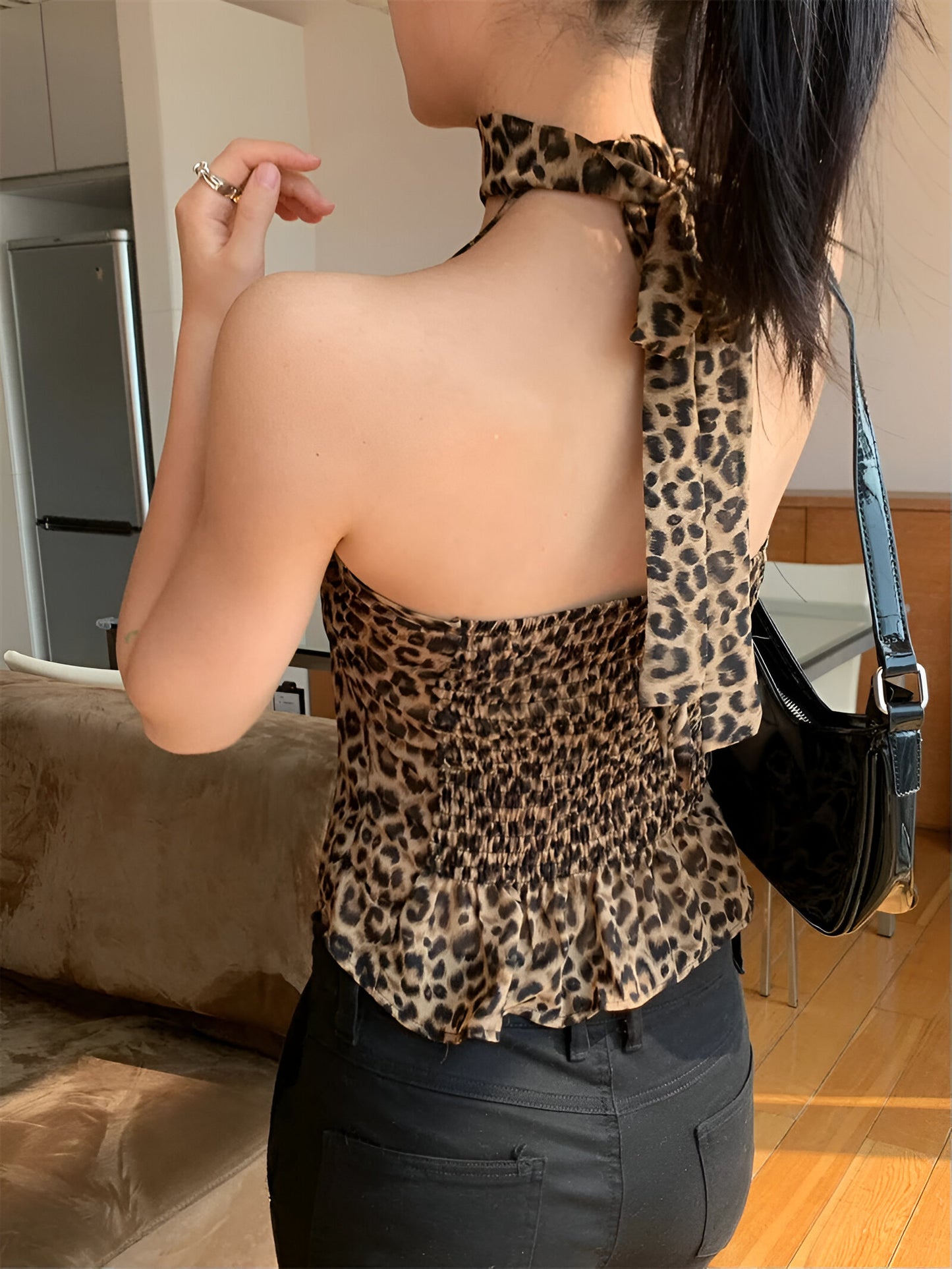 Top de leopardo com babados