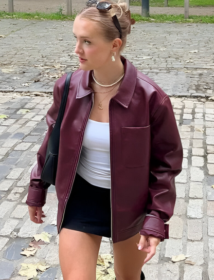 Manteau en cuir rouge avec fermeture éclair et poches