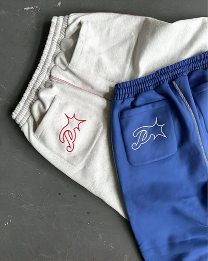 Calça relaxada com letras bordadas UrbanFlex